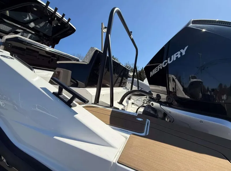 Slide: The Image of 2025 Navan S30 boat with Mercury engine, featuring sleek design and modern amenities. - 22