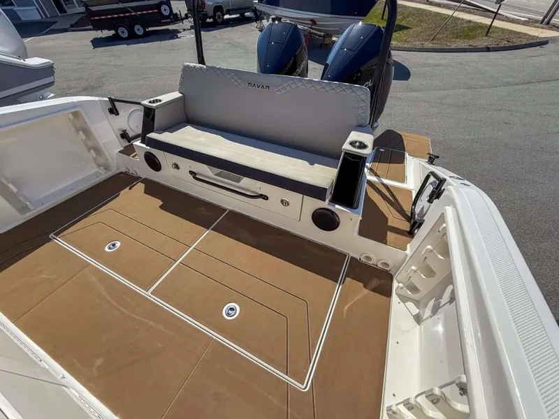 Slide: The Image of Navan S30 2025 boat interior with cushioned seating and storage compartments. - 4