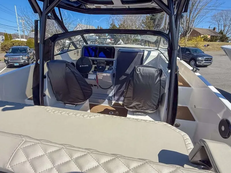 Slide: The Image of Interior view of 2025 Navan S30 boat with modern dashboard and seating. - 7