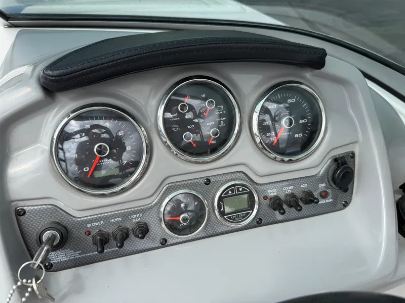 Slide: The Image of Dashboard of a 2017 Chaparral 19 H2O Sport boat with gauges and controls. - 5