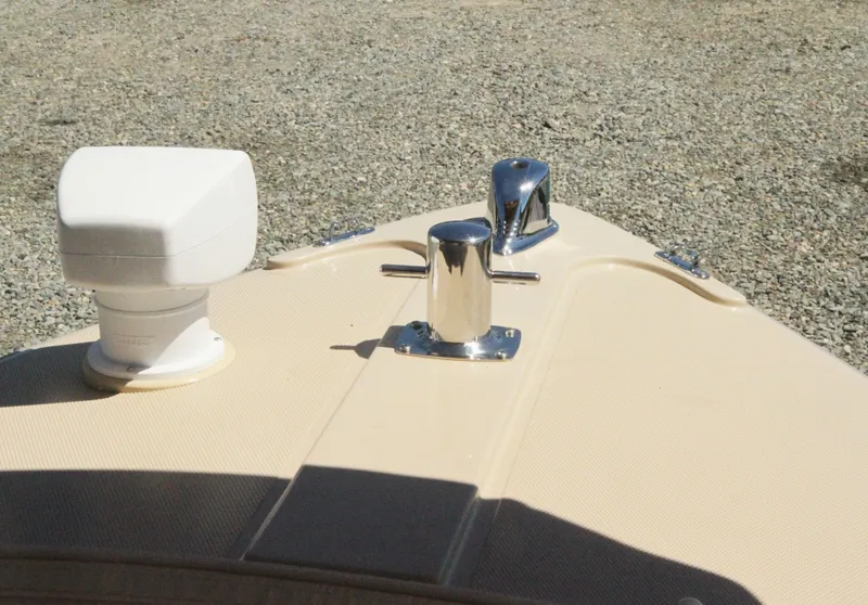 Slide: The Image of Bow of 2008 Duffy Snug Harbor 18 boat with cleat and radar. - 6