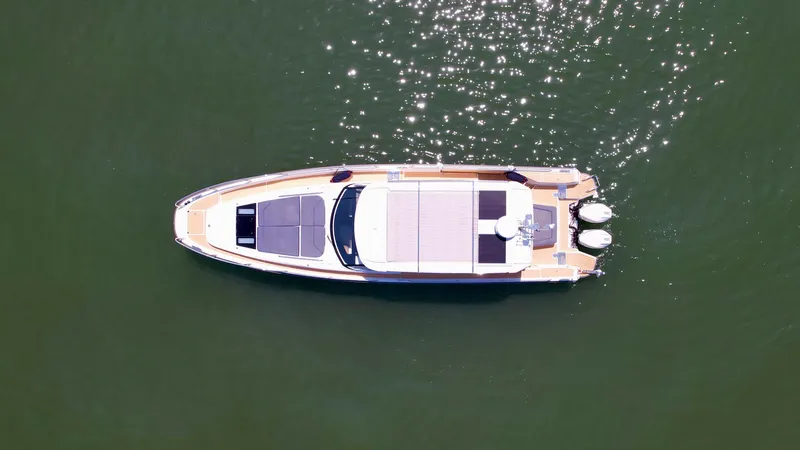 Slide: The Image of Aerial view of 2024 Nimbus W11 yacht on sparkling water. - 4