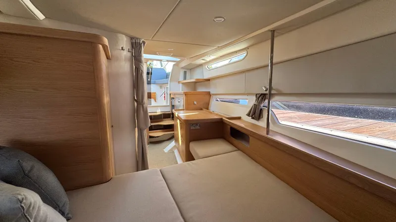 Slide: The Image of Luxurious interior of 2024 Nimbus W11 yacht, featuring elegant wood finishes and ample natural light. - 31
