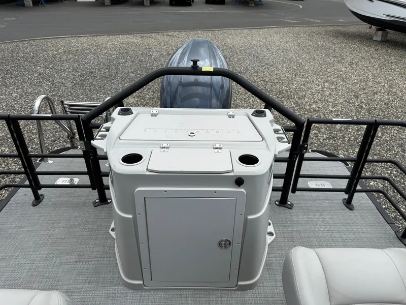 Slide: The Image of 2025 Sylvan L3 Party Fish boat deck with storage and cup holders. - 18