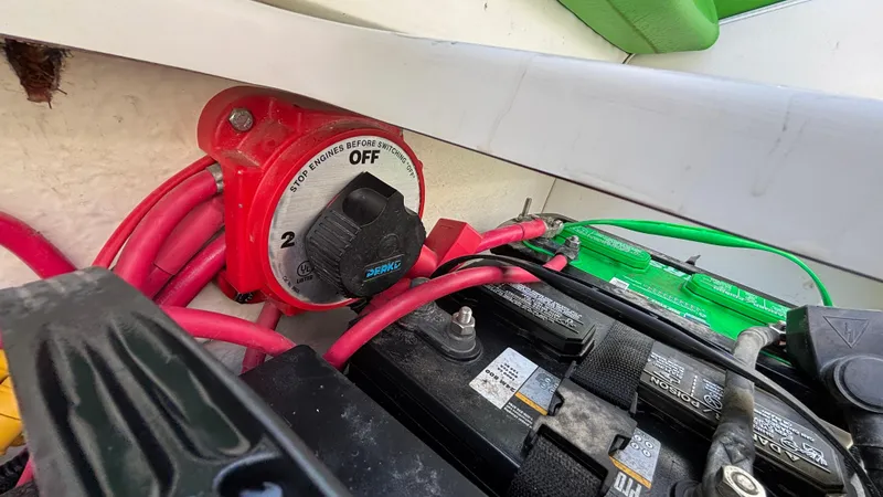 Slide: The Image of Battery switch and cables in a 2005 Baja 33 Outlaw boat. - 27