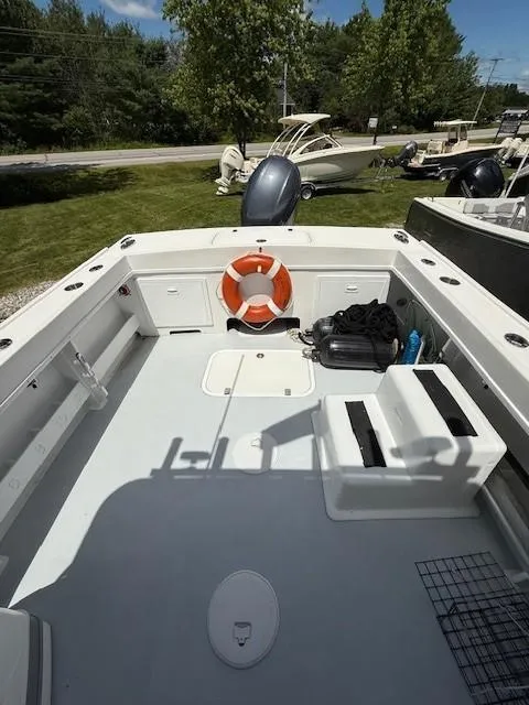 Slide: The Image of 2020 Steiger Craft 23 Miami boat deck with life preserver and seating. - 9