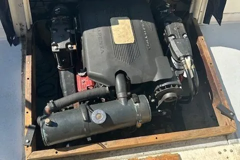 Slide: The Image of 1983 Grady-White TrophyPro engine compartment with visible components and machinery. - 3