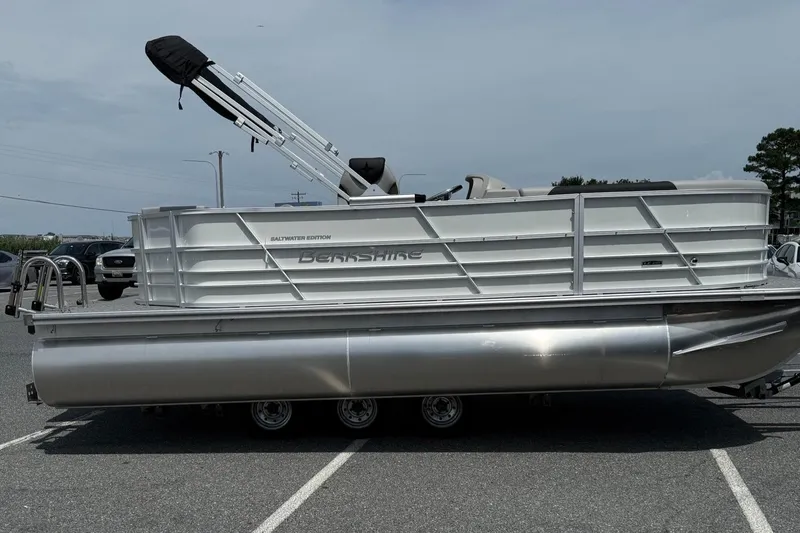 Slide: The Image of 2025 Berkshire 20CL LE 2.75 pontoon boat parked on asphalt. - 4