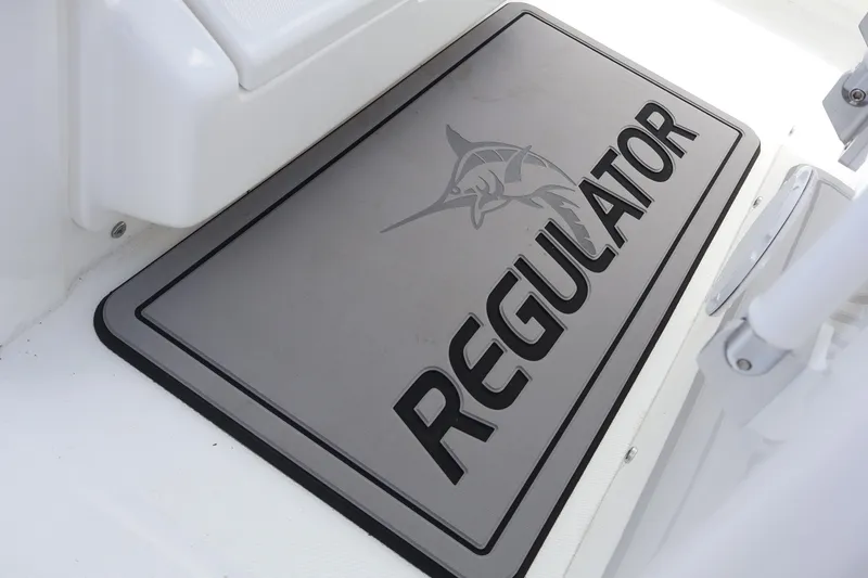 Slide: The Image of Floor mat with "Regulator" logo on a 2025 Regulator 31 boat. - 14