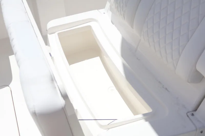Slide: The Image of 2025 Regulator 31 boat seat with integrated storage compartment. - 9
