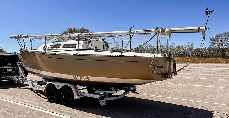 Slide: The Image of 1982 S2 7.9 sailboat on trailer, parked in sunny lot, ready for transport. - 13