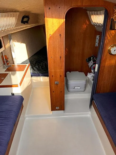 Slide: The Image of Interior of 1982 S2 7.9 sailboat with cozy cabin and compact amenities. - 15