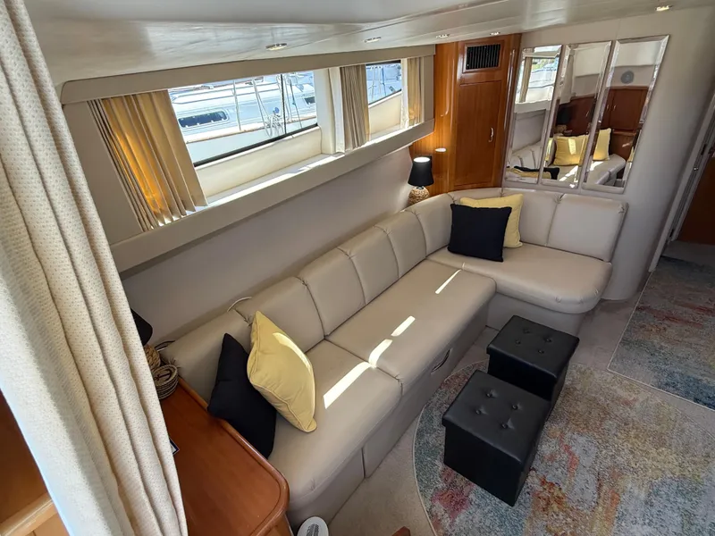 Slide: The Image of Luxurious interior of 2006 Carver 36 Mariner yacht with elegant seating and decor. - 25