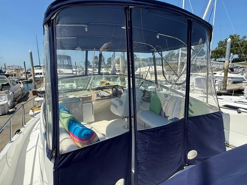 Slide: The Image of 2006 Carver 36 Mariner yacht with enclosed cockpit, docked at marina. - 5