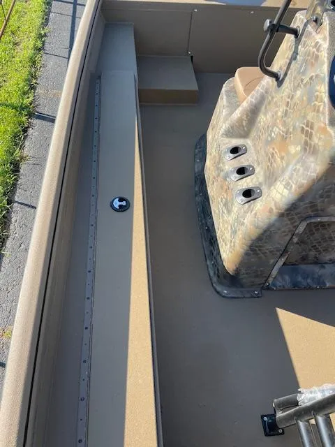 Slide: The Image of 2025 Excel 2172 Cat Pro CC boat interior with camouflage console and seating. - 7