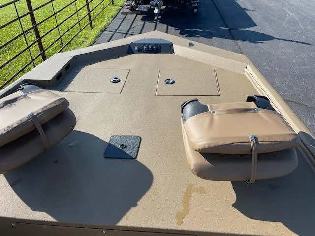 Slide: The Image of Excel 2172 Cat Pro CC boat deck, 2025 model, with tan seating and storage compartments. - 8