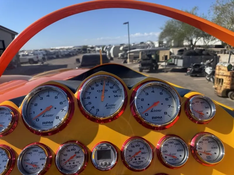 Slide: The Image of Dashboard of a 2006 Eliminator 33 Daytona boat with Livorsi gauges. - 34