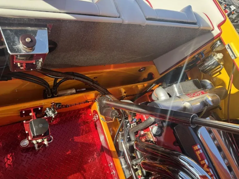 Slide: The Image of Engine compartment of a 2006 Eliminator 33 Daytona boat, showcasing detailed mechanical components. - 48