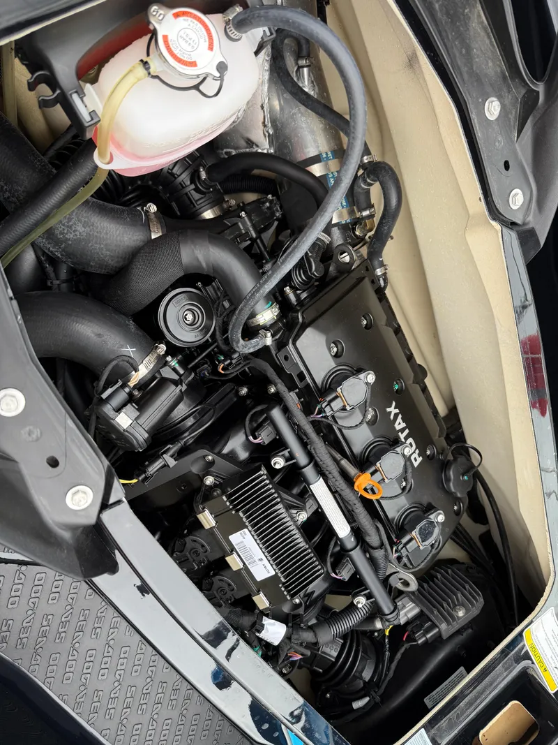 Slide: The Image of 2019 Sea-Doo GTR 230 engine compartment showcasing detailed mechanical components. - 10