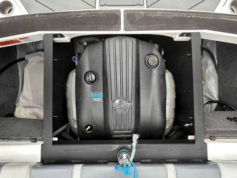 Slide: The Image of 2021 Malibu Wakesetter 21 VLX engine compartment with Monsoon engine visible. - 18