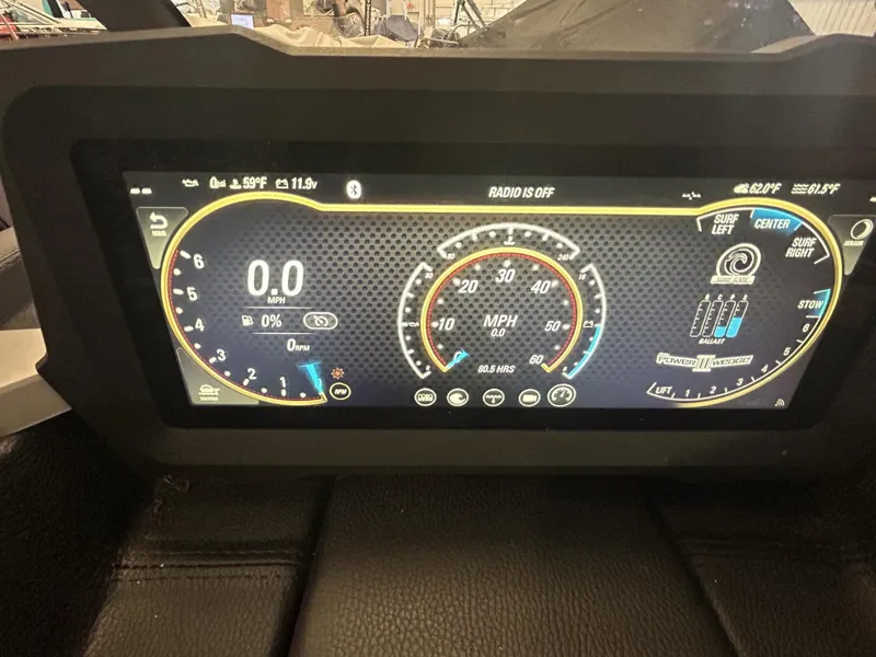 Slide: The Image of Dashboard display of 2021 Malibu Wakesetter 21 VLX showing speedometer and controls. - 19
