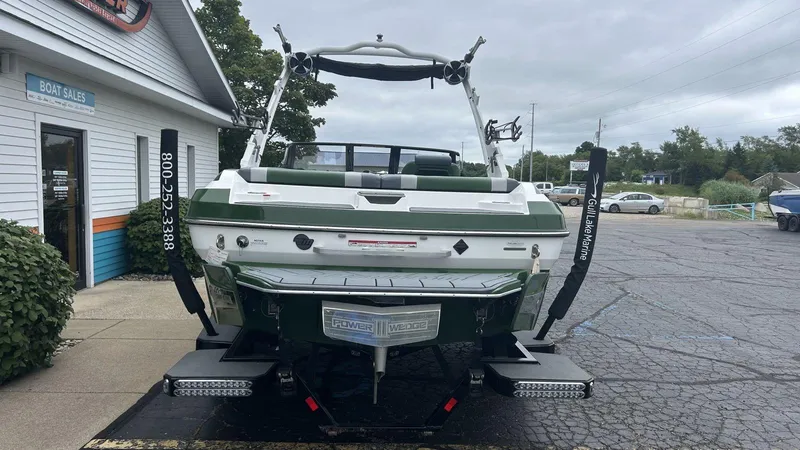 Slide: The Image of 2021 Malibu Wakesetter 21 VLX boat at dealership, rear view. - 3