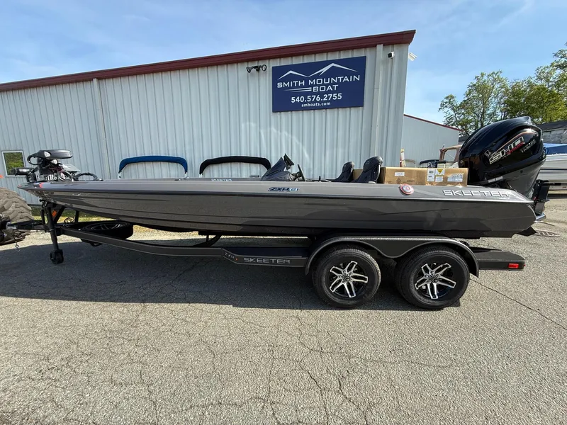 The Image of 2025 Skeeter ZXR21 boat on trailer at Smith Mountain Boat dealership. - 1
