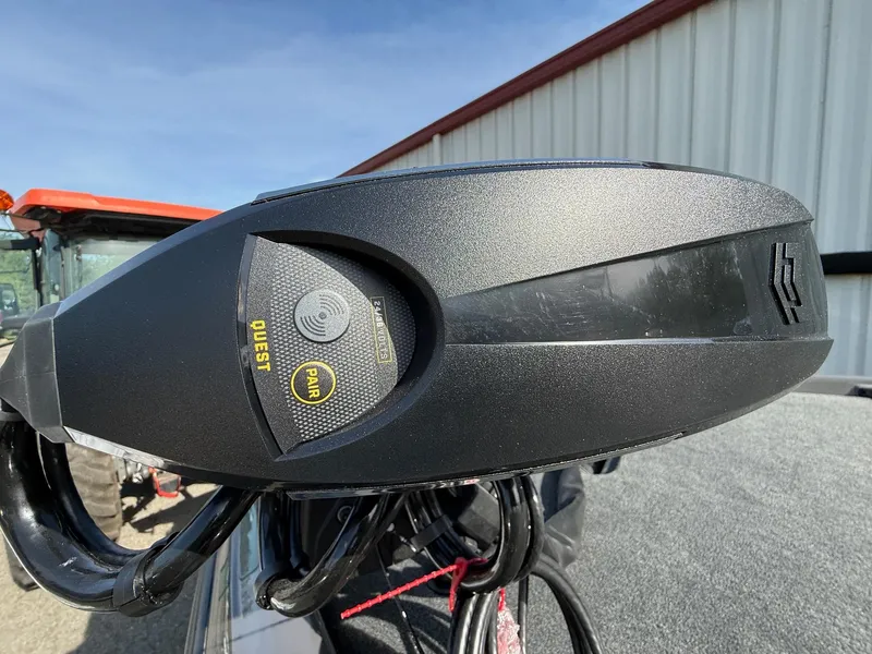 Slide: The Image of Close-up of 2025 Skeeter ZXR21 boat motor with Quest and Pair buttons. - 10