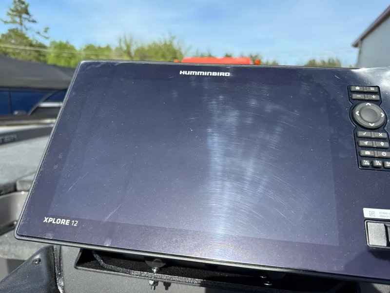 Slide: The Image of Humminbird Xplore 12 fishfinder on 2025 Skeeter ZXR21 boat, sunny day. - 18