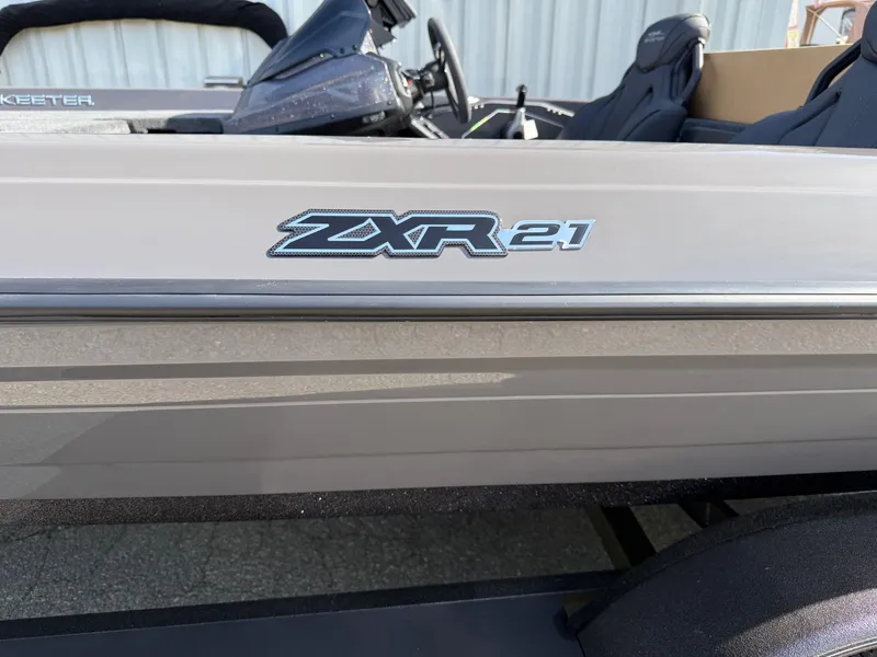 Slide: The Image of 2025 Skeeter ZXR21 boat side view with logo detail. - 4