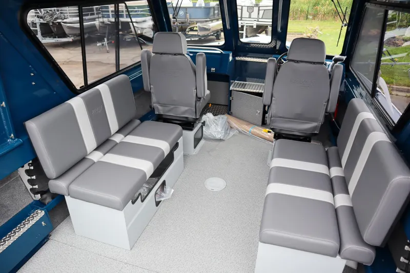 Slide: The Image of Interior of 2025 Hewescraft 240 Ocean Pro ET HT boat with gray seating. - 9