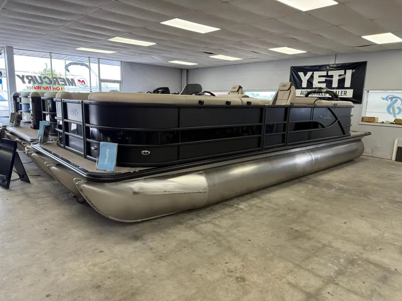 The Image of 2026 Bentley Pontoons Legacy 243 Navigator displayed indoors, showcasing sleek design and modern features. - 0