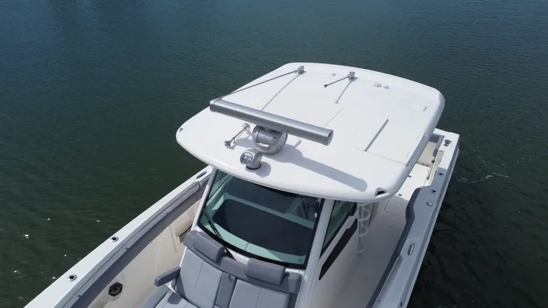 Slide: The Image of The 2027 Boston Whaler 380 Outrage features a sleek design with a spacious deck and modern amenities. - 18