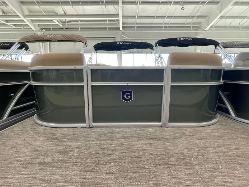 Slide: The Image of 2026 Godfrey Xperience 2086 CX pontoon boat in showroom, front view. - 1