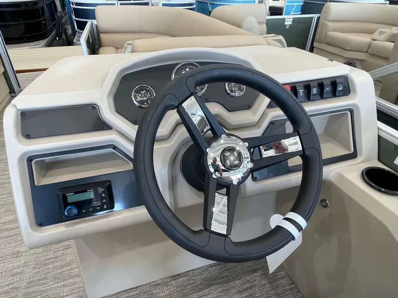 Slide: The Image of Steering console of 2026 Godfrey Xperience 2086 CX pontoon boat with modern controls. - 6