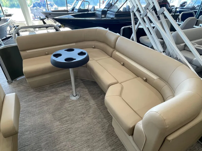 Slide: The Image of Luxurious seating on 2026 Godfrey Xperience 2086 CX pontoon boat with cupholder table. - 8