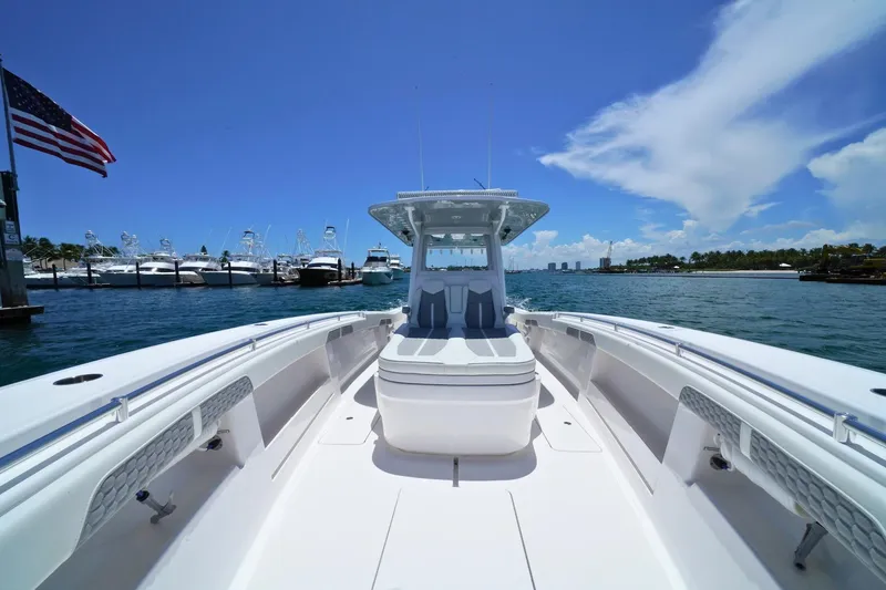 Slide: The Image of 2025 Invincible 39 Open Fisherman boat docked in sunny marina. - 10