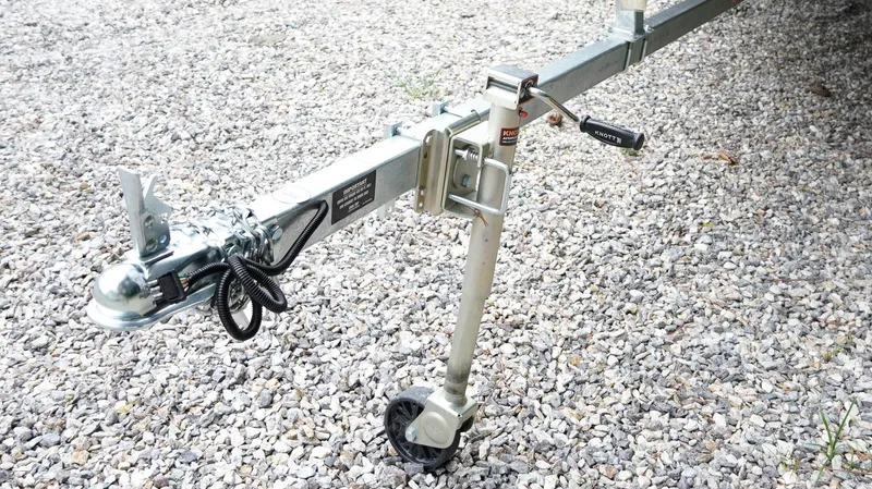 Slide: The Image of Trailer hitch and jack on gravel, G3 1548 VBW, 2025 model. - 8