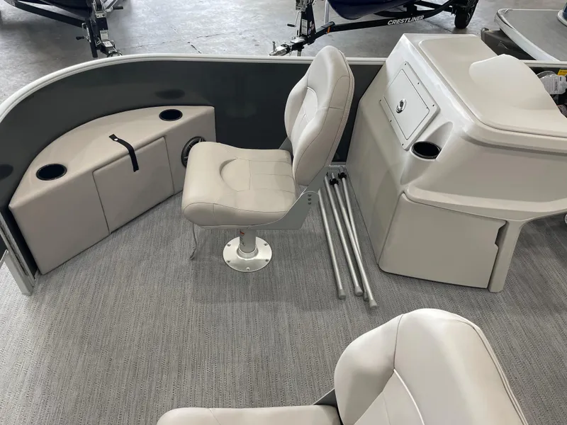 Slide: The Image of Interior of 2026 Godfrey Xperience 2086 FX boat with seating and storage compartments. - 5