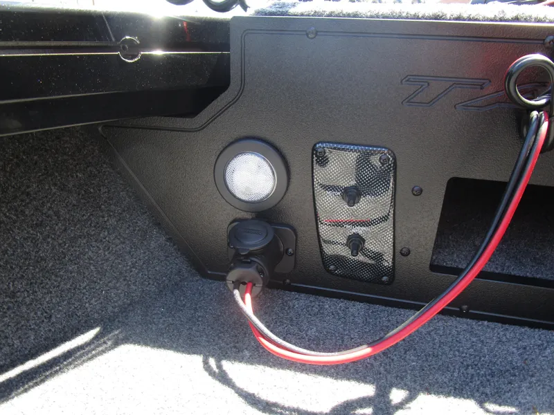 Slide: The Image of 2026 Tracker Targa V18 Combo boat interior wiring and control panel. - 9