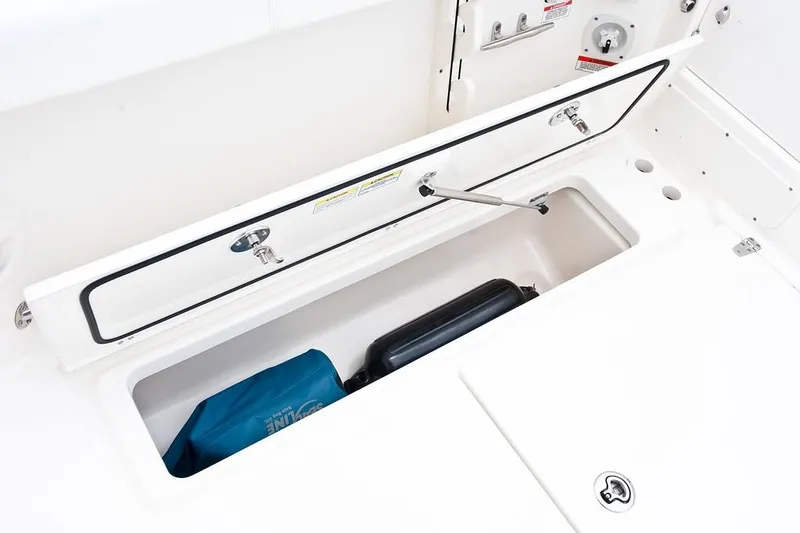 Slide: The Image of Manufacturer Provided Image: 2019 Boston Whaler 285 Conquest storage compartment with gear. - 16