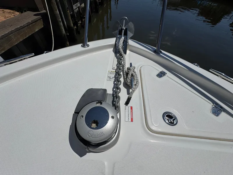 Slide: The Image of Bow of 2019 Boston Whaler 285 Conquest with anchor chain and winch system. - 27