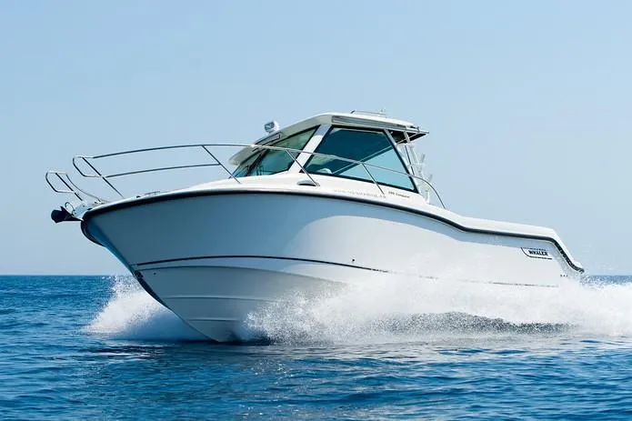 Slide: The Image of Manufacturer Provided Image: 2019 Boston Whaler 285 Conquest cruising on open water. - 4