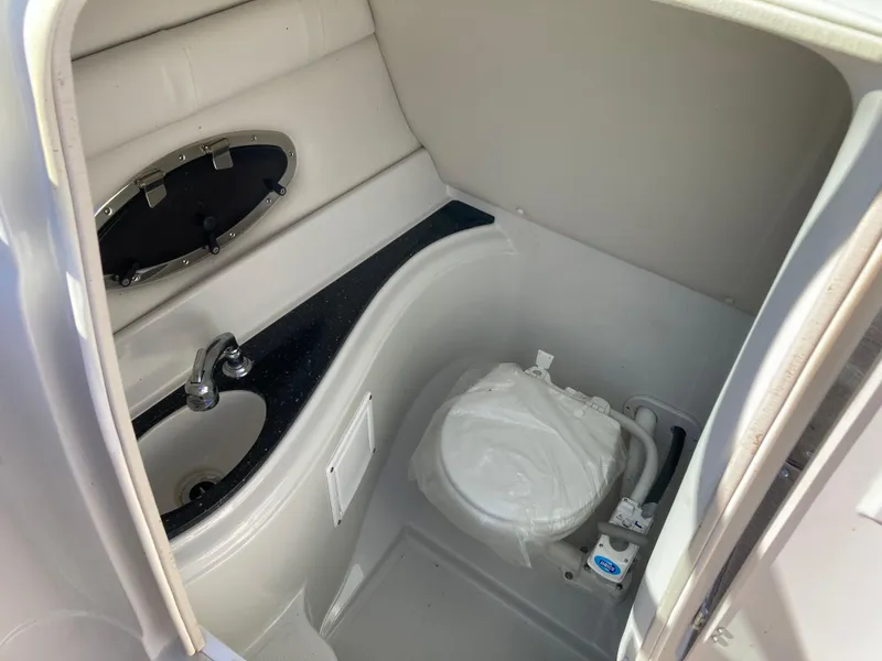Slide: The Image of 2007 Crownline 260 LS boat bathroom with sink and toilet. - 15