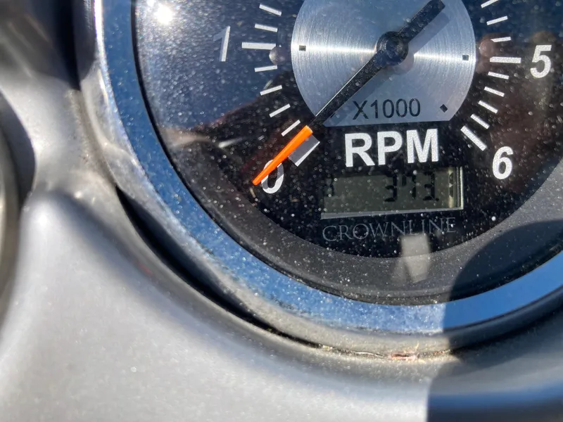 Slide: The Image of Close-up of 2007 Crownline 260 LS RPM gauge displaying 3.3 x 1000 RPM. - 16