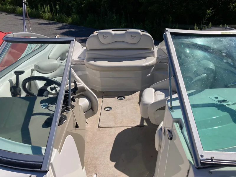 Slide: The Image of 2007 Crownline 260 LS boat interior with seating and steering wheel. - 21