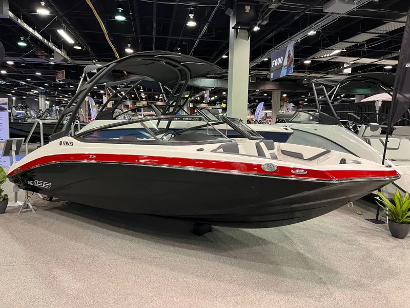 The Image of 2025 Yamaha AR195 boat displayed at a trade show. - 0