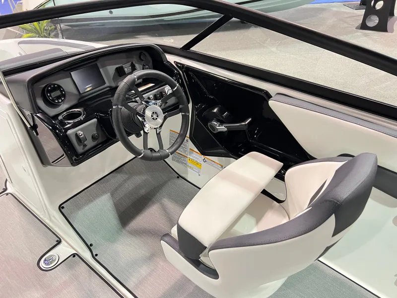 Slide: The Image of Interior of 2025 Yamaha Boats AR195 featuring modern helm. - 5