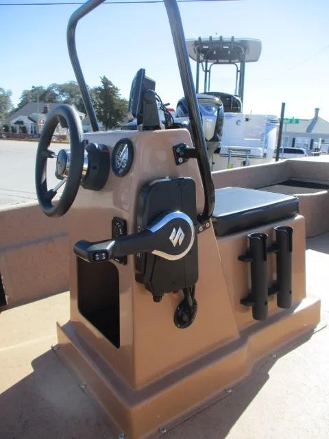 Slide: The Image of 2023 Rabco 16 Buccaneer boat console with steering wheel and controls. - 11