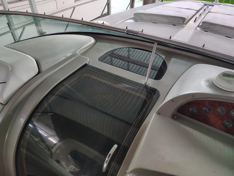 Slide: The Image of 1997 Bayliner 4085 Avanti boat dashboard with gauges and windshield. - 29